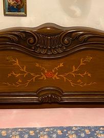 Letto in legno antico