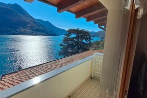 Bella mansarda con vista libera sul lago di Como
