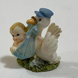 Bimbo Bambino Neonato con Cicogna Tenero Azzurro