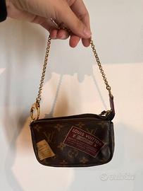 Louis Vuitton: Mini Pochette Accessoires