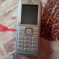 Nokia grigio con carica batterie