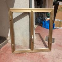 infissi in alluminio complete di ante e vetri