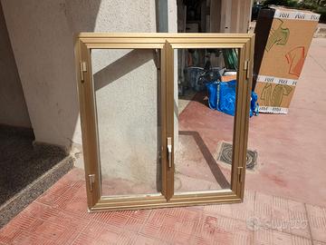 infissi in alluminio complete di ante e vetri