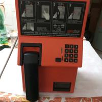 Telefono vintage a gettoni e monete 