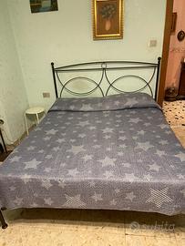 Letto in ferro battuto e materasso