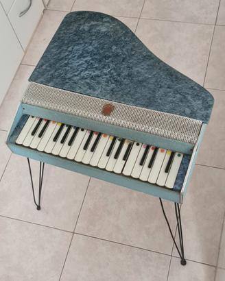 Pianoforte a coda giocattolo vintage 