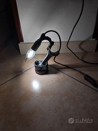 lampade con pistone