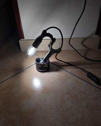 lampade con pistone