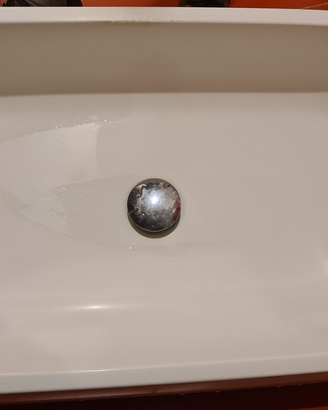 Lavabo da appoggio design in pietra scavata ovale