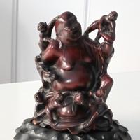 statua del Buddha con bambini fine anni '40
