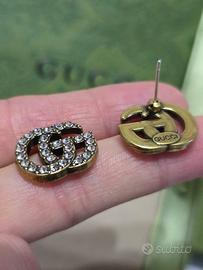 Orecchini Gucci inox con strass