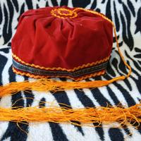 cappello greco con coda