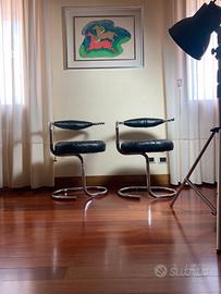 Sedie Cobra in pelle nera di Giotto Stoppino