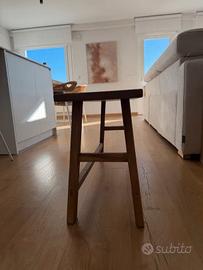 Banco de madera de olmo. Disponible en Zara Home