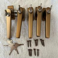 Maniglie finestra con chiave bronzate