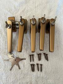 Maniglie finestra con chiave bronzate