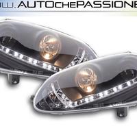 Gruppi ottici anteriori Real DAYLINE neri per VW G