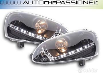 Gruppi ottici anteriori Real DAYLINE neri per VW G