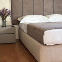 Testata letto artigianale nuova tessuto/vera pelle