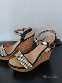 Sandali con zeppa alta