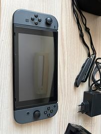 Nintendo switch grigia+ accessori e giochi