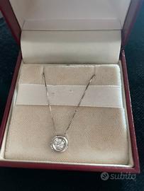 Punto luce oro 750 e diamante naturale 0,80 ct