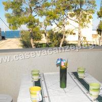 Casa con Veranda FRONTE MARE 2 camere A/C 4 Posti