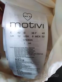 piumino lungo motivi