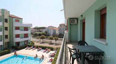 Bilocale fronte piscina