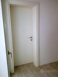 Porte bianche ral 9010 cassa massiccia su misura