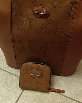 borsa e portafoglio Thun