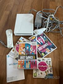 Wii console + giochi (just dance/sports/party)