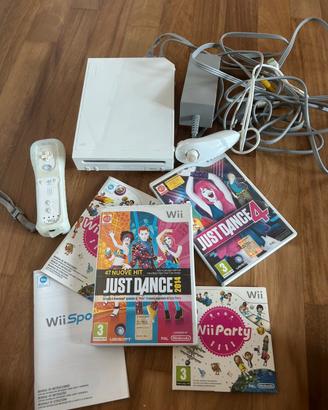 Wii console + giochi (just dance/sports/party)