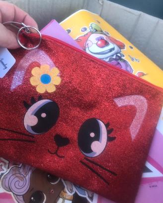 Borsellino glitterato con un gatto disegnato