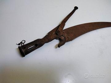 Antica taglia rami con sega annessa americana