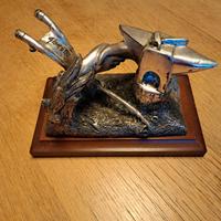 scultura in metallo argentato "Il lavoro dell'uomo