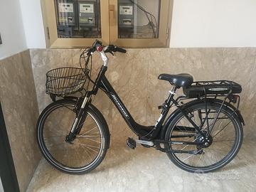 Bicicletta elettrica e lucchetto Kryptonyte 
