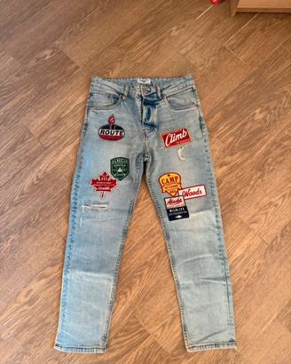 Jeans con loghi