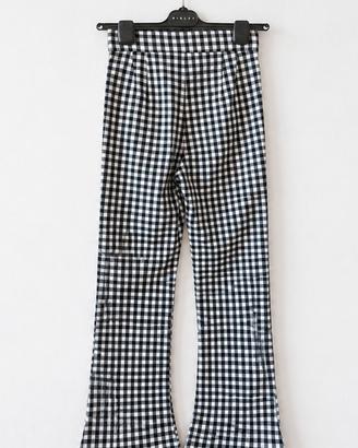 Pantalone a zampa per donna bianco e nero a quadri
