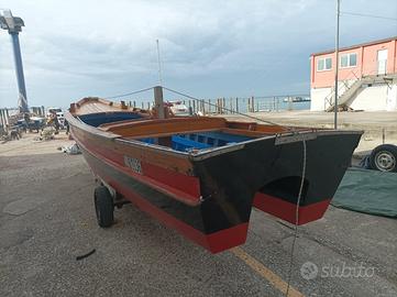 Barca in legno topo / topa a motore