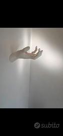 portacuffie a forma di mano