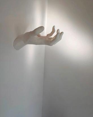 portacuffie a forma di mano