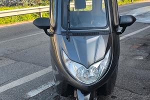 Triciclo scooter elettricco cabinato UFO Magnum 