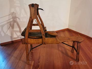 Macchina antica per cardare la lana