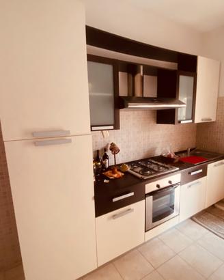 Angolo cucina, camera matrimoniale, sala da pranzo