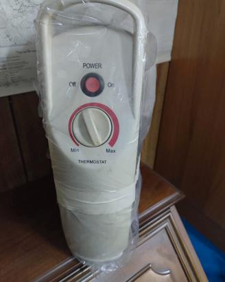 Radiatore 4 elementi elettrico portatile