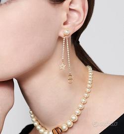 Nuovi orecchini a stella con catena CD Dior