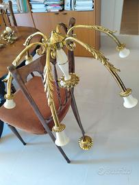 Lampadario e coppia applique in foglia d'oro 