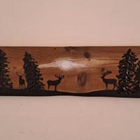 Quadro da montagna: cervi nel bosco