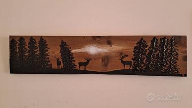 Quadro da montagna: cervi nel bosco